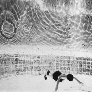 Man Standing on Bottom of Pool