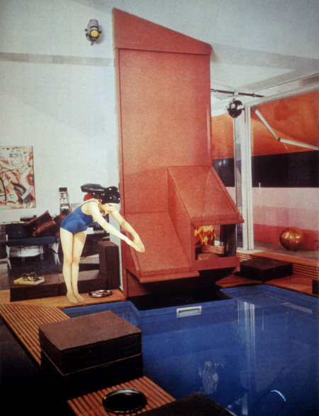 Photo college in red and blue depicting a woman in a blue bathing suit and blue bathing cap about to dive into a blue indoor swimming pool